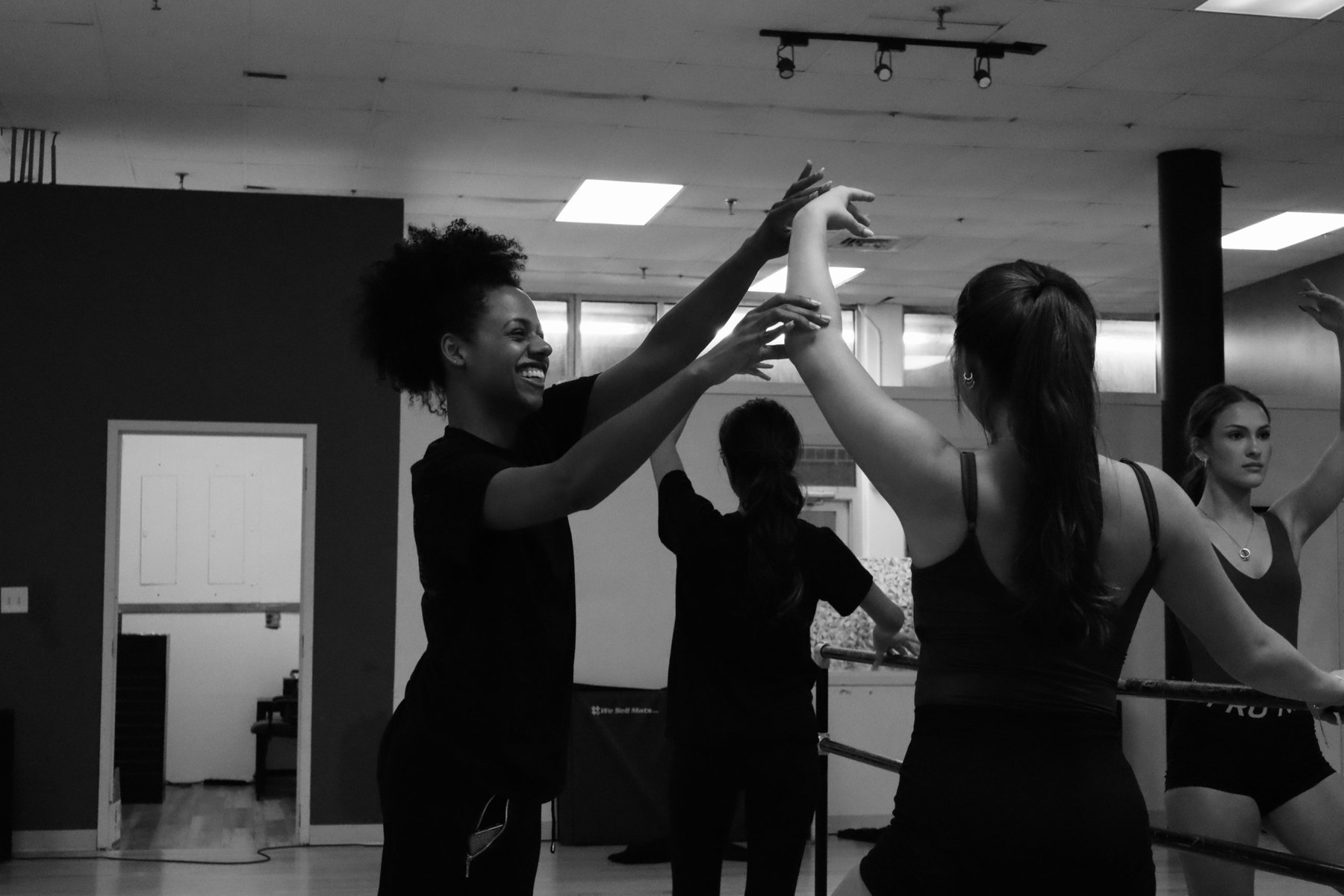 A teacher working with a dancer